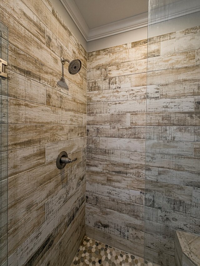 105 Planters Row, Tifton, GA 31793 - full bathroom featuring ornamental molding and a tile shower
