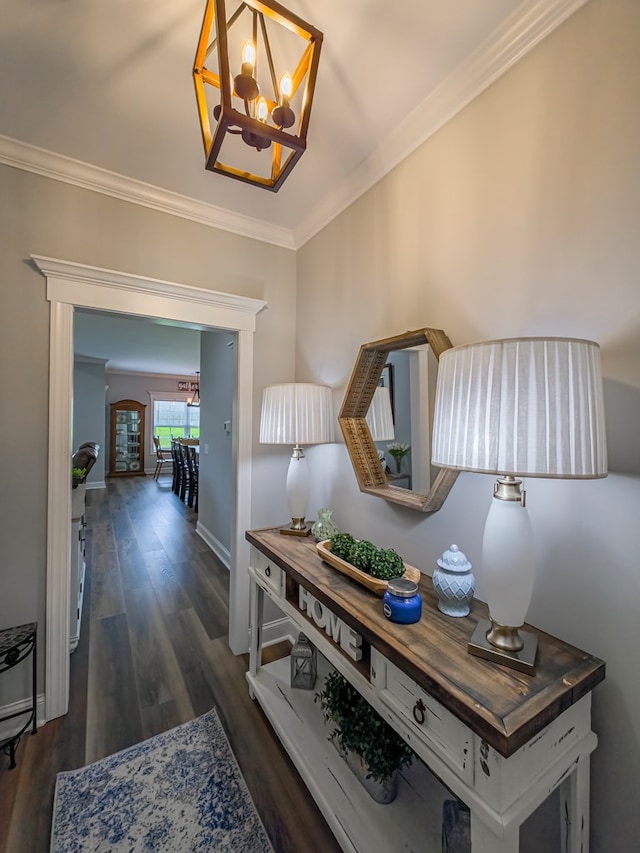 105 Planters Row, Tifton, GA 31793 - hallway featuring a chandelier, ornamental molding, dark wood-type flooring, and baseboards
