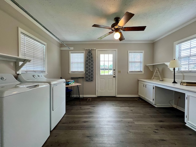 laundry room featuring independent washer and dryer, crown molding, plenty of natural light, and cabinet space