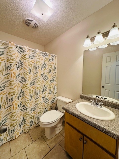 122 Ericas Ct, Fitzgerald, GA 31750 - bathroom featuring vanity, a textured ceiling, tile patterned floors, and curtained shower