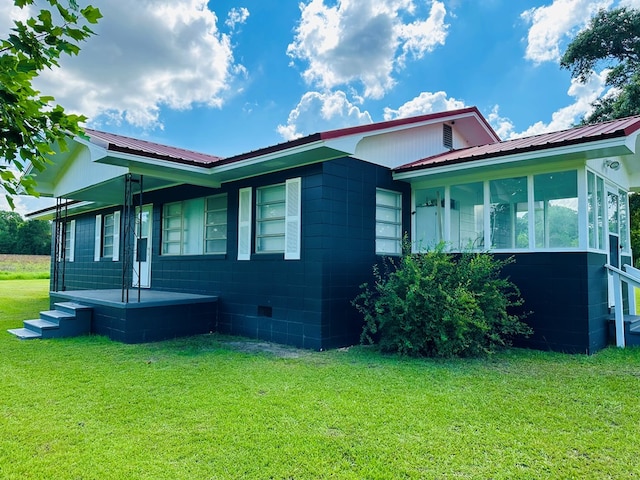 1222 Minton Rd, Sylvester, GA 31791 - view of property exterior with a lawn and a metal roof