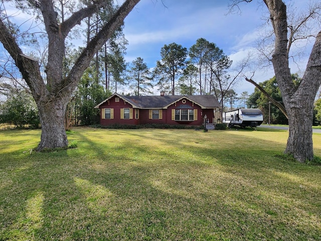 410 W Henderson St, Ocilla, GA 31774 - ranch-style home with a front lawn and a chimney