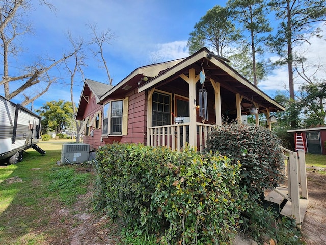 410 W Henderson St, Ocilla, GA 31774 - view of home's exterior with a porch and central air condition unit