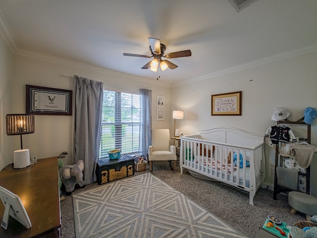 560 Osprey Cir, Tifton, GA 31794 - carpeted bedroom featuring ornamental molding, a nursery area, and a ceiling fan