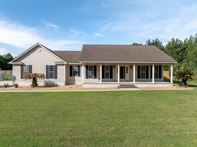 34 Alan Ln, Tifton, GA 31793 - view of front of property with a porch, a front yard, and roof with shingles