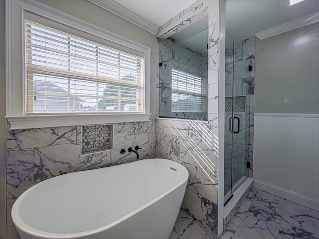 34 Alan Ln, Tifton, GA 31793 - bathroom with marble look tile flooring, a freestanding tub, crown molding, a shower stall, and wainscoting