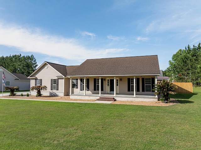 34 Alan Ln, Tifton, GA 31793 - view of front facade with a porch, a front lawn, and roof with shingles