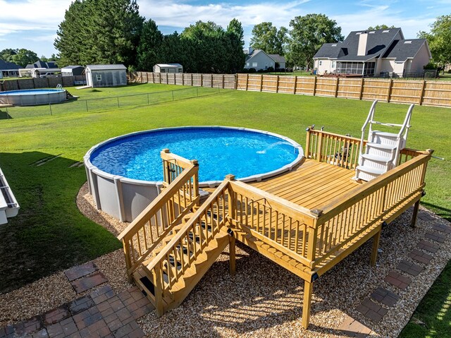 34 Alan Ln, Tifton, GA 31793 - view of swimming pool featuring a wooden deck