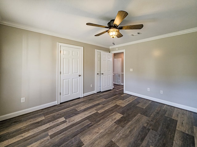 34 Alan Ln, Tifton, GA 31793 - unfurnished bedroom with dark wood-style flooring, ornamental molding, baseboards, and a ceiling fan