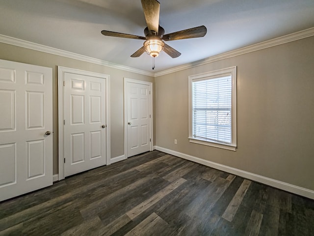 34 Alan Ln, Tifton, GA 31793 - unfurnished bedroom featuring baseboards, dark wood-style flooring, crown molding, and a ceiling fan