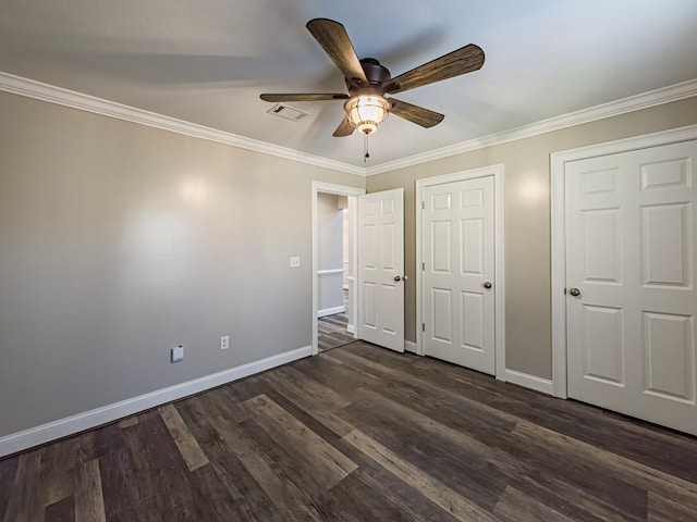 34 Alan Ln, Tifton, GA 31793 - unfurnished bedroom featuring baseboards, dark wood-style flooring, ornamental molding, and ceiling fan