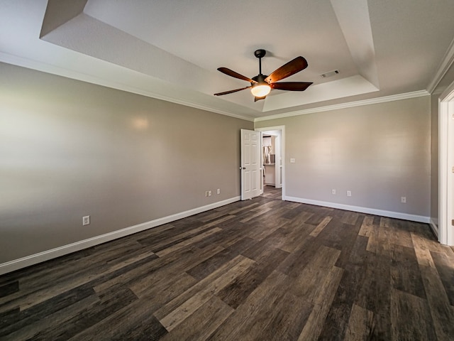 34 Alan Ln, Tifton, GA 31793 - spare room with a raised ceiling, a ceiling fan, dark wood-type flooring, baseboards, and ornamental molding