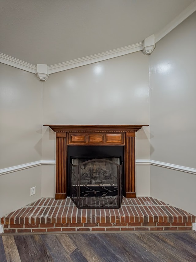 34 Alan Ln, Tifton, GA 31793 - detailed view of wood finished floors, a fireplace with raised hearth, and crown molding
