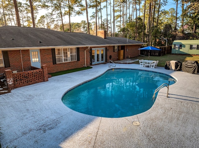 1447 Davis Ave, Tifton, GA 31794 - outdoor pool featuring a patio and french doors