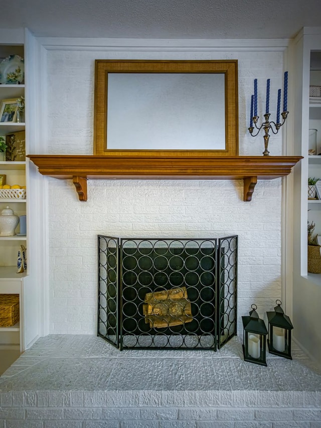 1447 Davis Ave, Tifton, GA 31794 - room details featuring built in shelves and a textured ceiling