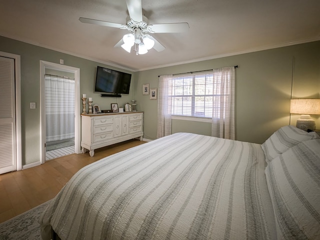 1447 Davis Ave, Tifton, GA 31794 - bedroom featuring wood finished floors, baseboards, and ornamental molding