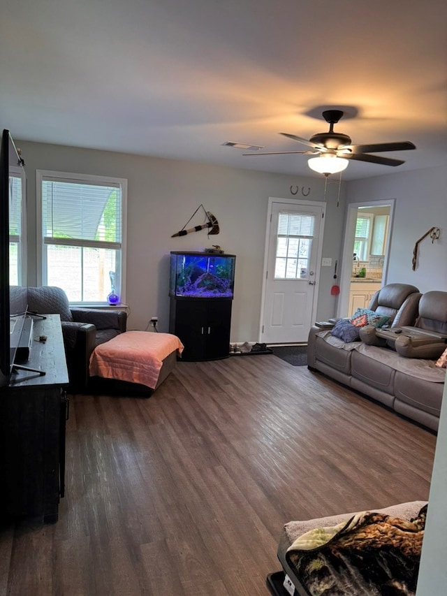 3524 Moss Island Ct, Albany, GA 31721 - living area with dark wood-style floors and ceiling fan
