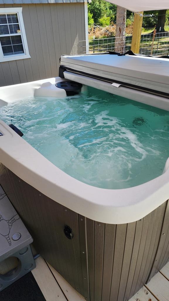 3524 Moss Island Ct, Albany, GA 31721 - view of swimming pool with a hot tub