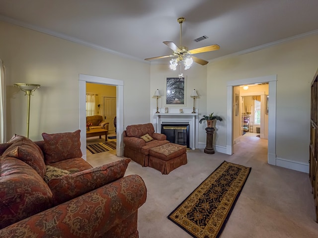 64 Palmetta Rd, Tifton, GA 31794 - living room with crown molding, a ceiling fan, carpet floors, and a glass covered fireplace