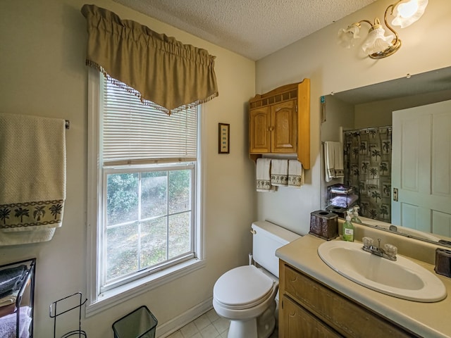 64 Palmetta Rd, Tifton, GA 31794 - bathroom featuring vanity, a textured ceiling, tile patterned floors, and a shower with curtain