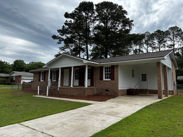 2019 N Central Ave, Tifton, GA 31794 - single story home with driveway, an attached carport, crawl space, brick siding, and covered porch