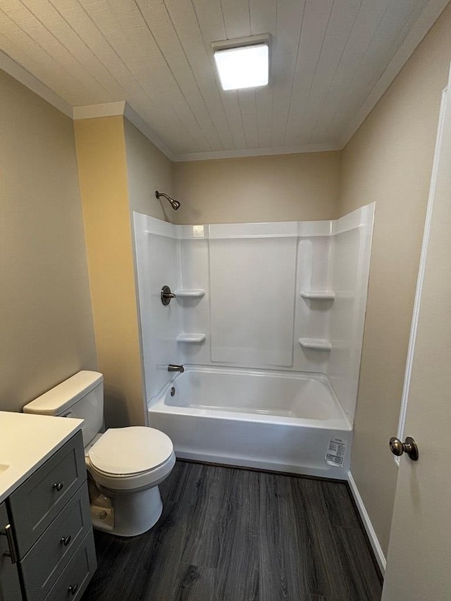 2019 N Central Ave, Tifton, GA 31794 - full bathroom featuring wood finished floors, vanity, toilet, crown molding, and washtub / shower combination