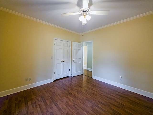 11 Fairway Dr, Tifton, GA 31793 - unfurnished bedroom featuring dark wood-type flooring, ornamental molding, baseboards, and a ceiling fan