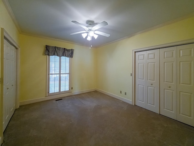 11 Fairway Dr, Tifton, GA 31793 - unfurnished bedroom with crown molding, visible vents, baseboards, a ceiling fan, and carpet