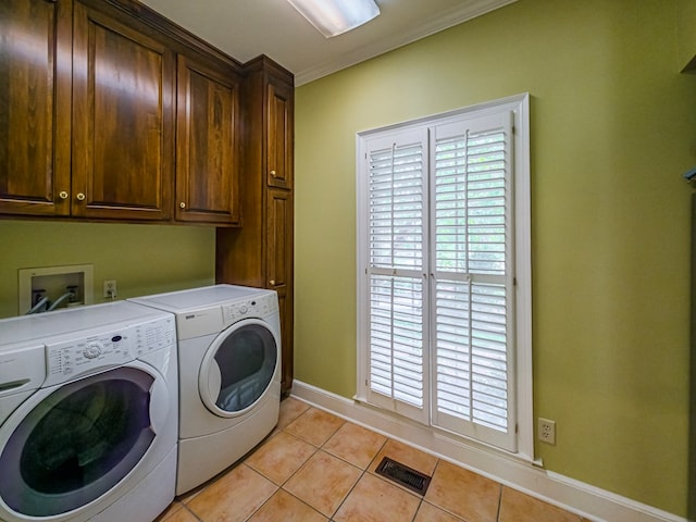 11 Fairway Dr, Tifton, GA 31793 - laundry room with visible vents, baseboards, washer and clothes dryer, cabinet space, and light tile patterned floors
