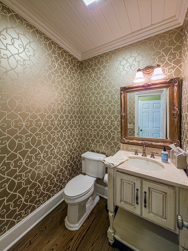 11 Fairway Dr, Tifton, GA 31793 - bathroom featuring crown molding, vanity, toilet, and wallpapered walls
