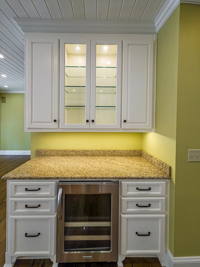 11 Fairway Dr, Tifton, GA 31793 - bar featuring crown molding, wine cooler, baseboards, recessed lighting, and dark wood finished floors