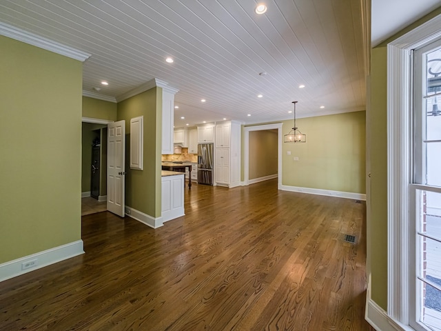 11 Fairway Dr, Tifton, GA 31793 - unfurnished living room with crown molding, recessed lighting, and a chandelier