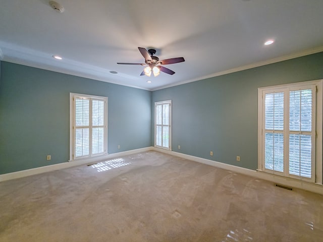 11 Fairway Dr, Tifton, GA 31793 - carpeted spare room featuring crown molding, baseboards, visible vents, and ceiling fan