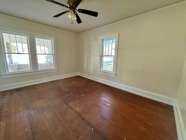 416 W 6th St, Tifton, GA 31794 - empty room with visible vents, baseboards, a ceiling fan, and dark wood-style floors