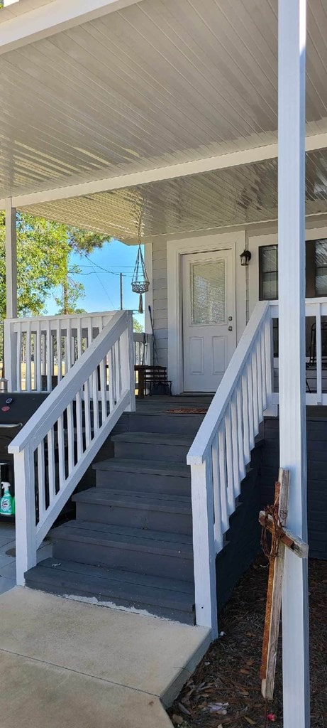 307 E Pinson St, Sylvester, GA 31791 - wooden deck featuring covered porch and stairway