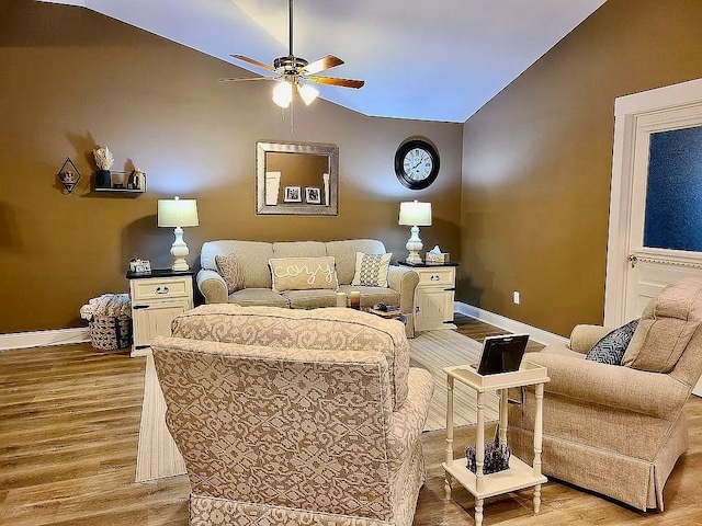 307 E Pinson St, Sylvester, GA 31791 - living room featuring baseboards, ceiling fan, wood finished floors, and lofted ceiling