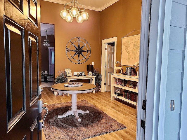 307 E Pinson St, Sylvester, GA 31791 - entrance foyer featuring an inviting chandelier, ornamental molding, and wood finished floors