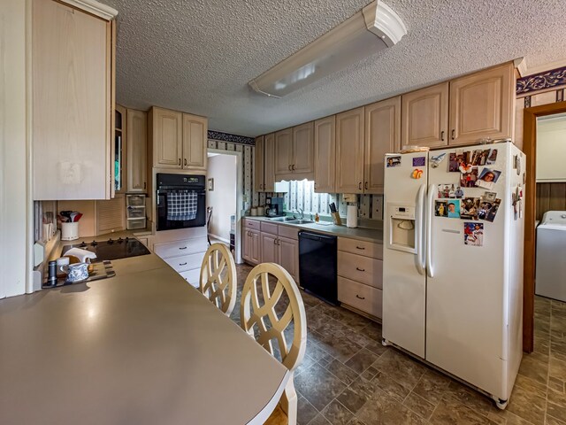 128 Airport Rd, Sylvester, GA 31791 - kitchen with black appliances, washer / dryer, a textured ceiling, light brown cabinets, and a sink