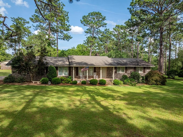 128 Airport Rd, Sylvester, GA 31791 - single story home with a front yard, a porch, and a chimney