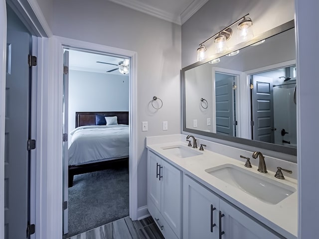 56 Willow Creek Dr, Tifton, GA 31793 - full bathroom featuring a sink, ornamental molding, double vanity, and ensuite bath