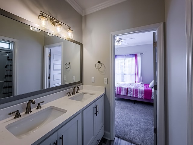 56 Willow Creek Dr, Tifton, GA 31793 - bathroom with crown molding, double vanity, a sink, and ensuite bathroom