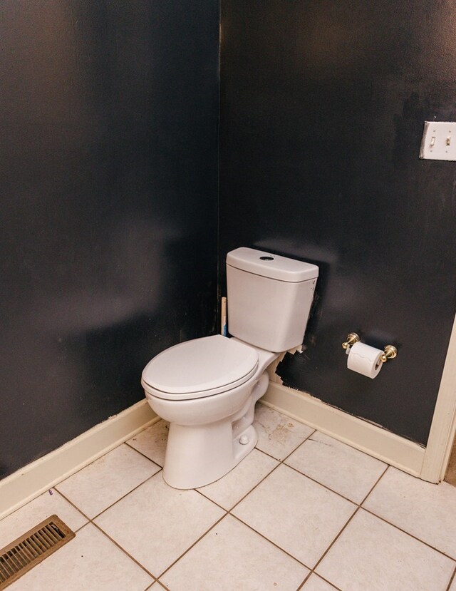 145 Bell Rd, Sylvester, GA 31791 - bathroom featuring toilet, tile patterned floors, baseboards, and visible vents