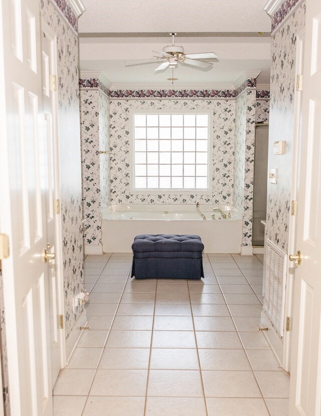 145 Bell Rd, Sylvester, GA 31791 - bathroom with ornamental molding, wallpapered walls, tile patterned flooring, a ceiling fan, and a garden tub