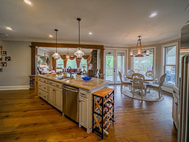 248 Gun Lake Loop, Tifton, GA 31794 - kitchen with dishwasher, cream cabinets, a chandelier, ornamental molding, and plenty of natural light