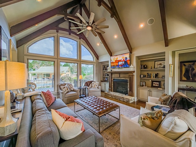 248 Gun Lake Loop, Tifton, GA 31794 - living area featuring a fireplace, beamed ceiling, wood finished floors, high vaulted ceiling, and recessed lighting