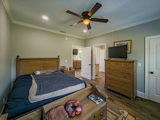 248 Gun Lake Loop, Tifton, GA 31794 - bedroom featuring attic access, wood finished floors, crown molding, connected bathroom, and recessed lighting