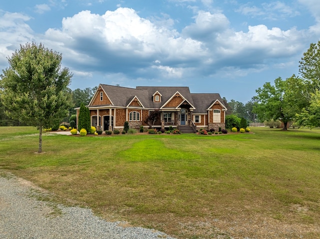 248 Gun Lake Loop, Tifton, GA 31794 - craftsman inspired home featuring a front lawn, stone siding, and gravel driveway