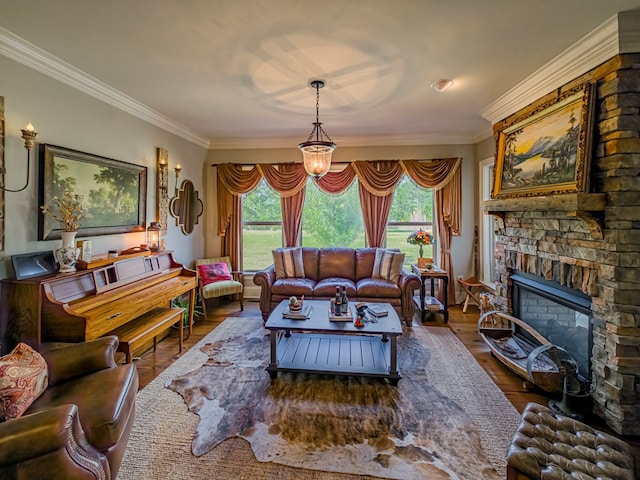 248 Gun Lake Loop, Tifton, GA 31794 - living room featuring plenty of natural light, wood finished floors, crown molding, and a stone fireplace