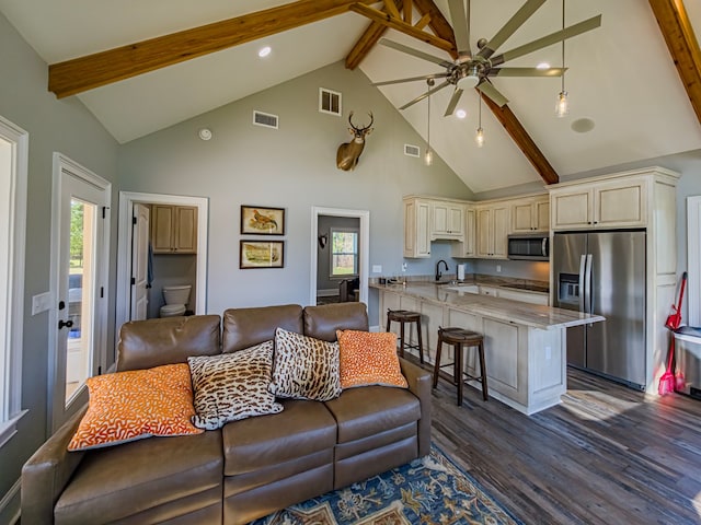 248 Gun Lake Loop, Tifton, GA 31794 - living area featuring beam ceiling, high vaulted ceiling, ceiling fan, dark wood finished floors, and recessed lighting