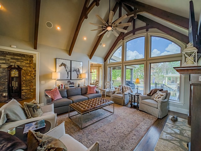 248 Gun Lake Loop, Tifton, GA 31794 - living area with hardwood / wood-style floors, beam ceiling, high vaulted ceiling, a fireplace, and a ceiling fan